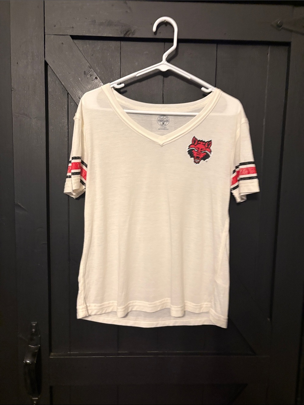 Rivalry Threads Cream V-Neck Short Sleeve Tee with Red & Black Wolf Patch